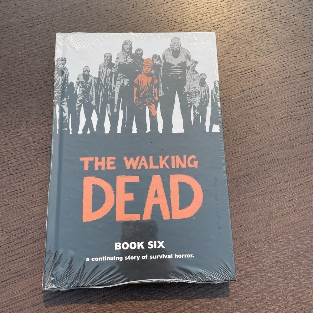 The Walking Dead hardcover graphic novel - Book Six.    New unopened.